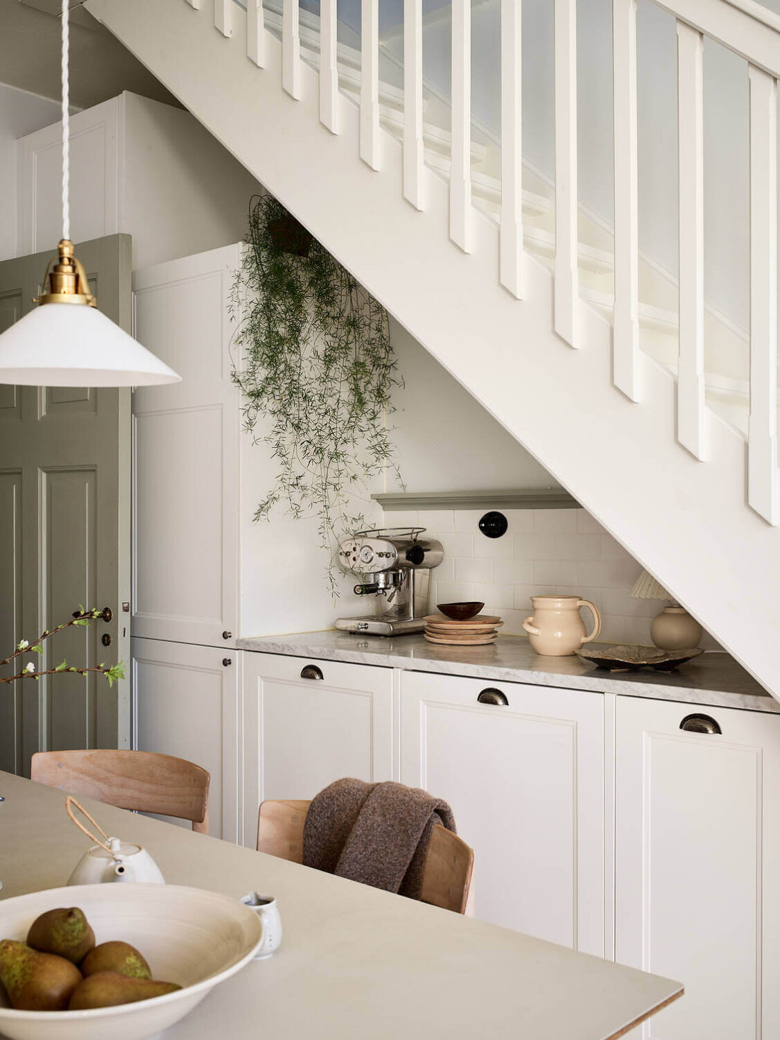A Light Scandinavian Maisonette 13 white-kitchen-under-stairs-nordroom