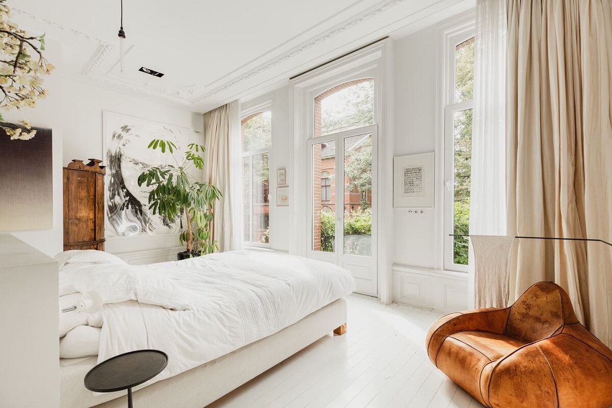 A Luxurious Townhouse in Amsterdam With Loft-Style Living Room 12 white-master-bedroom-luxurious-townhouse-amsterdam-nordroom