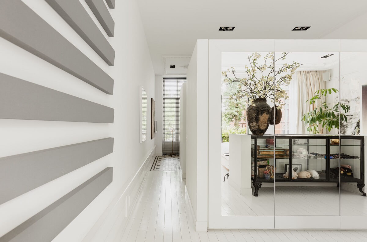 A Luxurious Townhouse in Amsterdam With Loft-Style Living Room 14 white-master-en-suite-closet-mirrors-nordroom