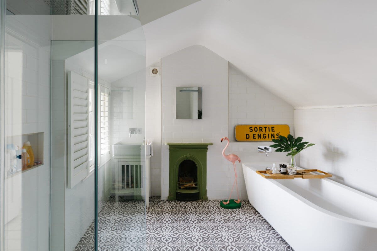 A Black and White Victorian House in London 34 attic-bathroom-green-fireplace-freestanding-bath-nordroom