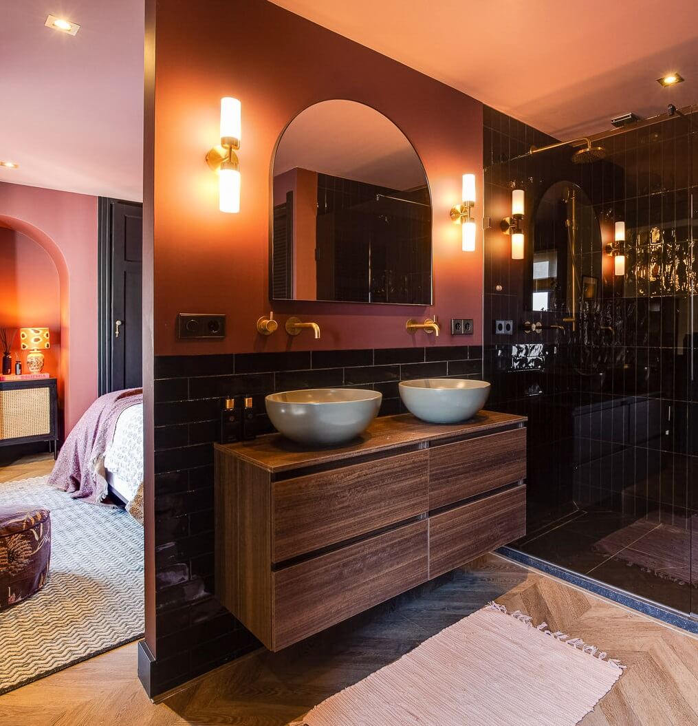 Best of 2022: Bathrooms 10 bathroom-black-shower-tiles-pink-walls-wooden-vanity-nordroom