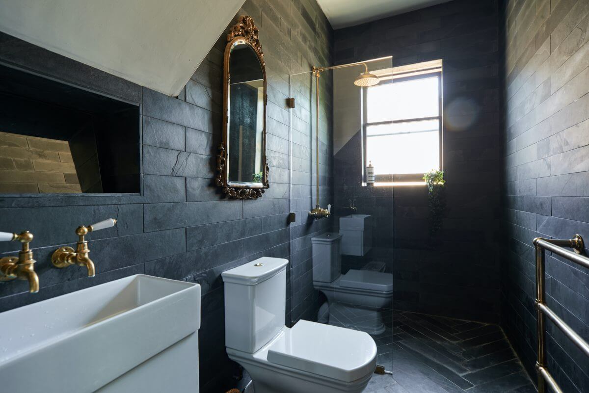 A Mixture of Styles in an English Home 17 bathroom-black-tiles-eclectic-home-bath-nordroom