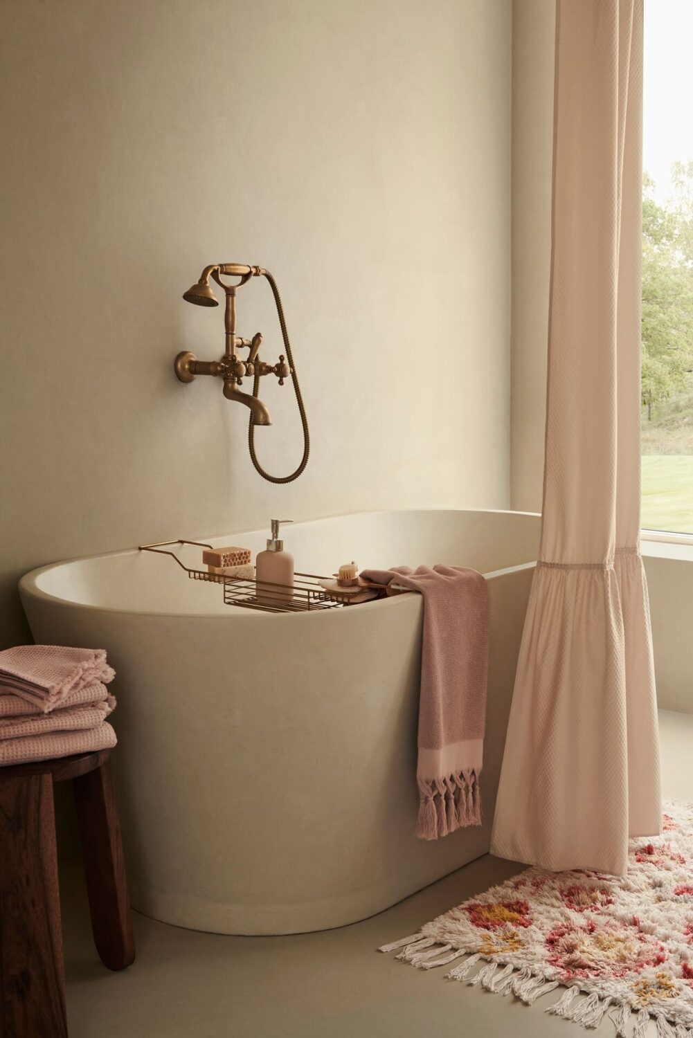89 Pink Bathroom Ideas: From Hot Pink Walls to Blush Tiles 112 bathroom-pink-textiles-freestanding-bath-nordroom
