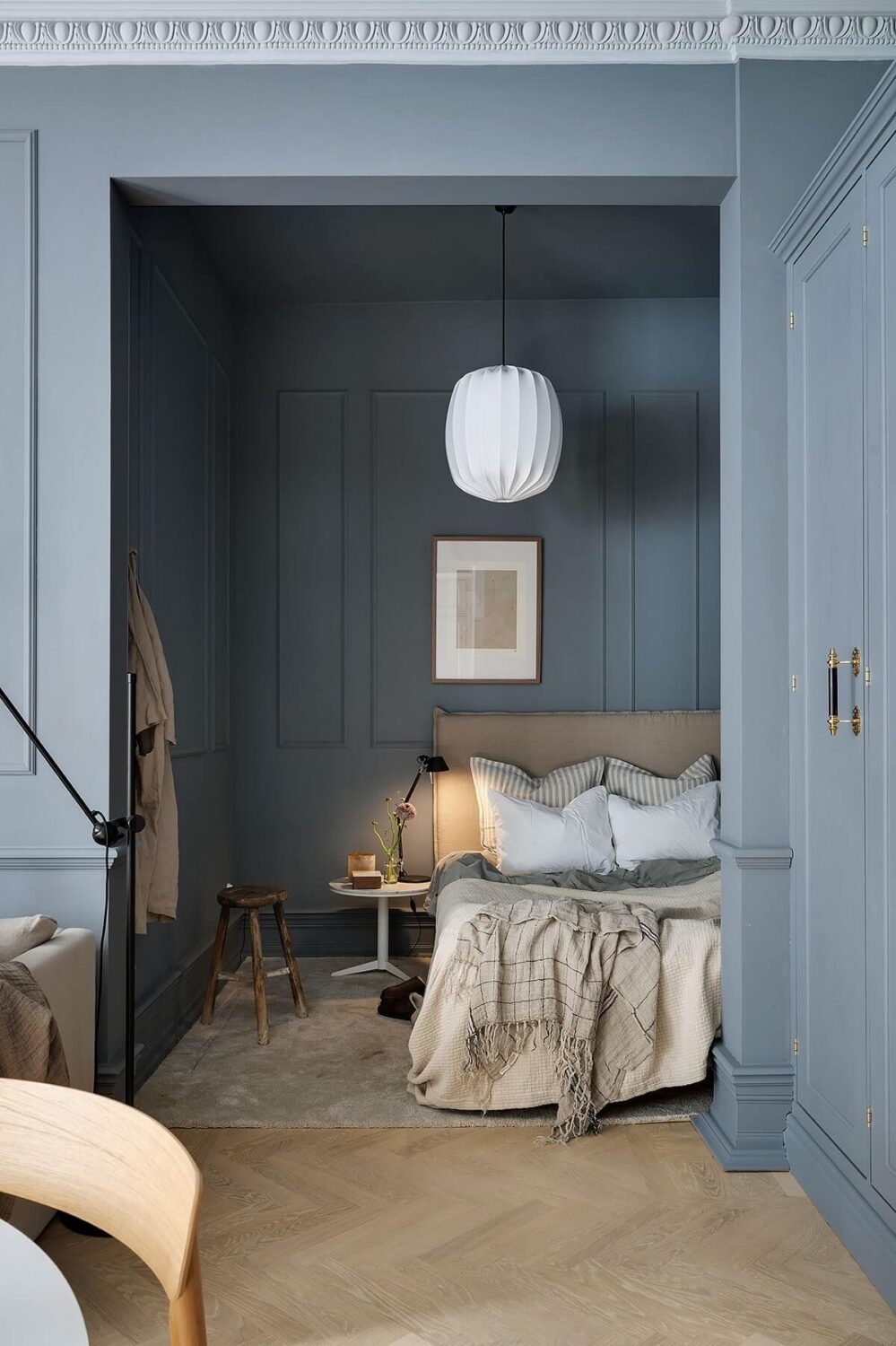 Great Living Room Bedroom Combo Ideas (Layout Tips + Styling) 44 bed-alcove-blue-studio-apartment-gray-accents-nordroom