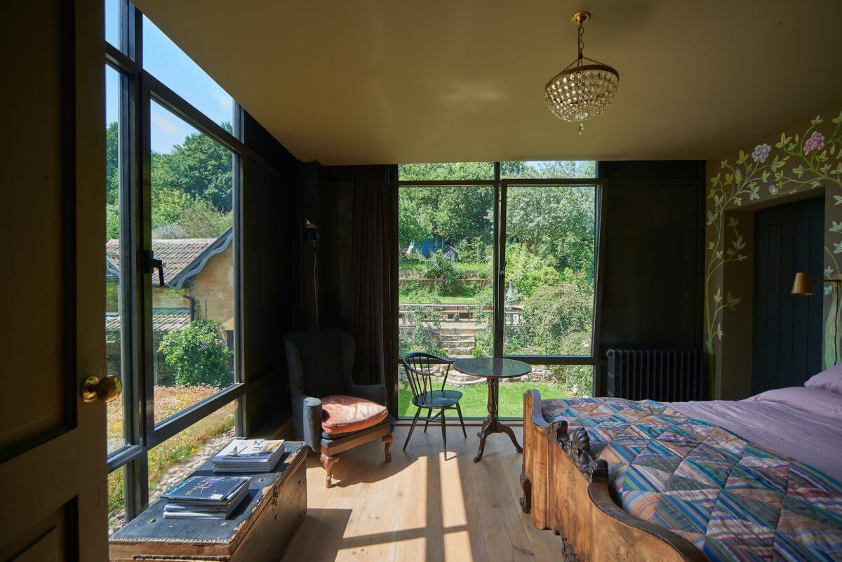 A Mixture of Styles in an English Home 16 bedroom-floral-painted-walls-nordroom
