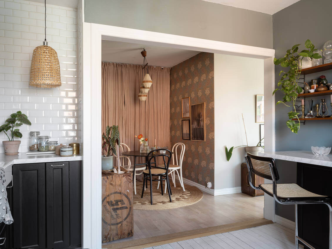 A Warm Neutral Colored Nordic Home 21 black-kitchen-open-plan-dining-room-nordroom