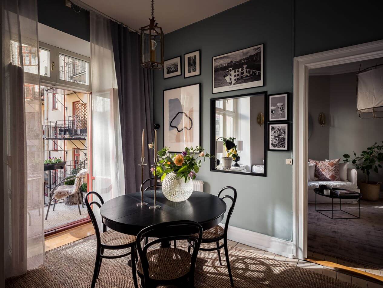 A Gray Studio Apartment with Spacious Kitchen 10 black-round-dining-table-gray-walls-studio-apartment-nordroom