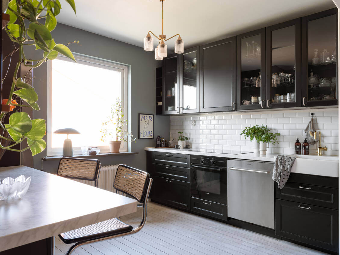 A Warm Neutral Colored Nordic Home 17 black-scandinavian-kitchen-nordroom