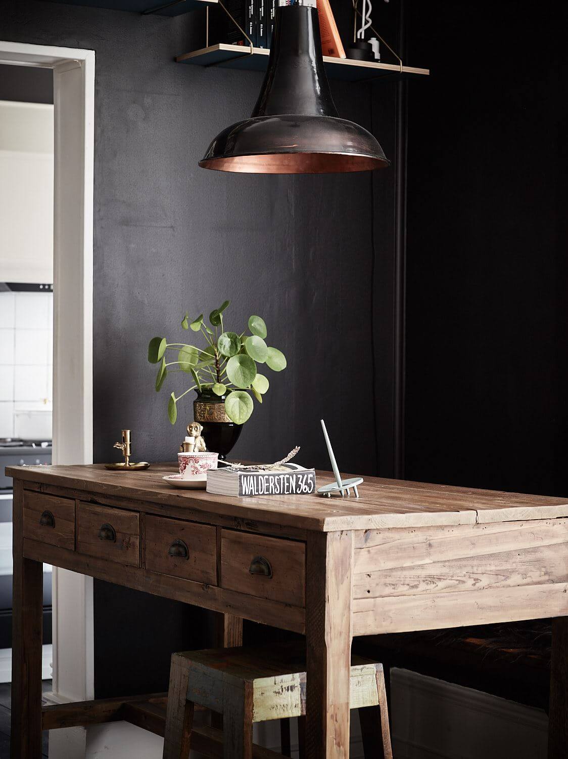 A Black Vintage Studio Apartment 8 black-studio-apartment-wooden-bar-table-nordroom