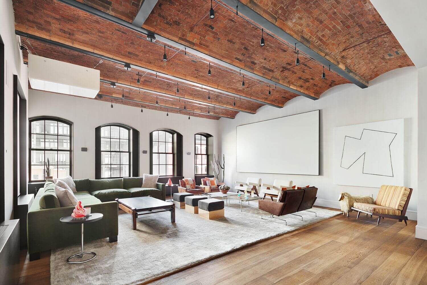 27 Statement Ceiling Ideas That Will Spruce Up Any Room 35 contemporary-manhattan-loft-jonah-hill-vaulted-ceiling-art-nordroom