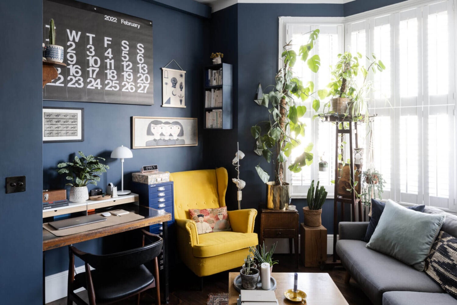 A Cozy Flat in London with Navy Blue Living Room 2 dark-blue-living-room-yellow-armchair-desk-nordroom