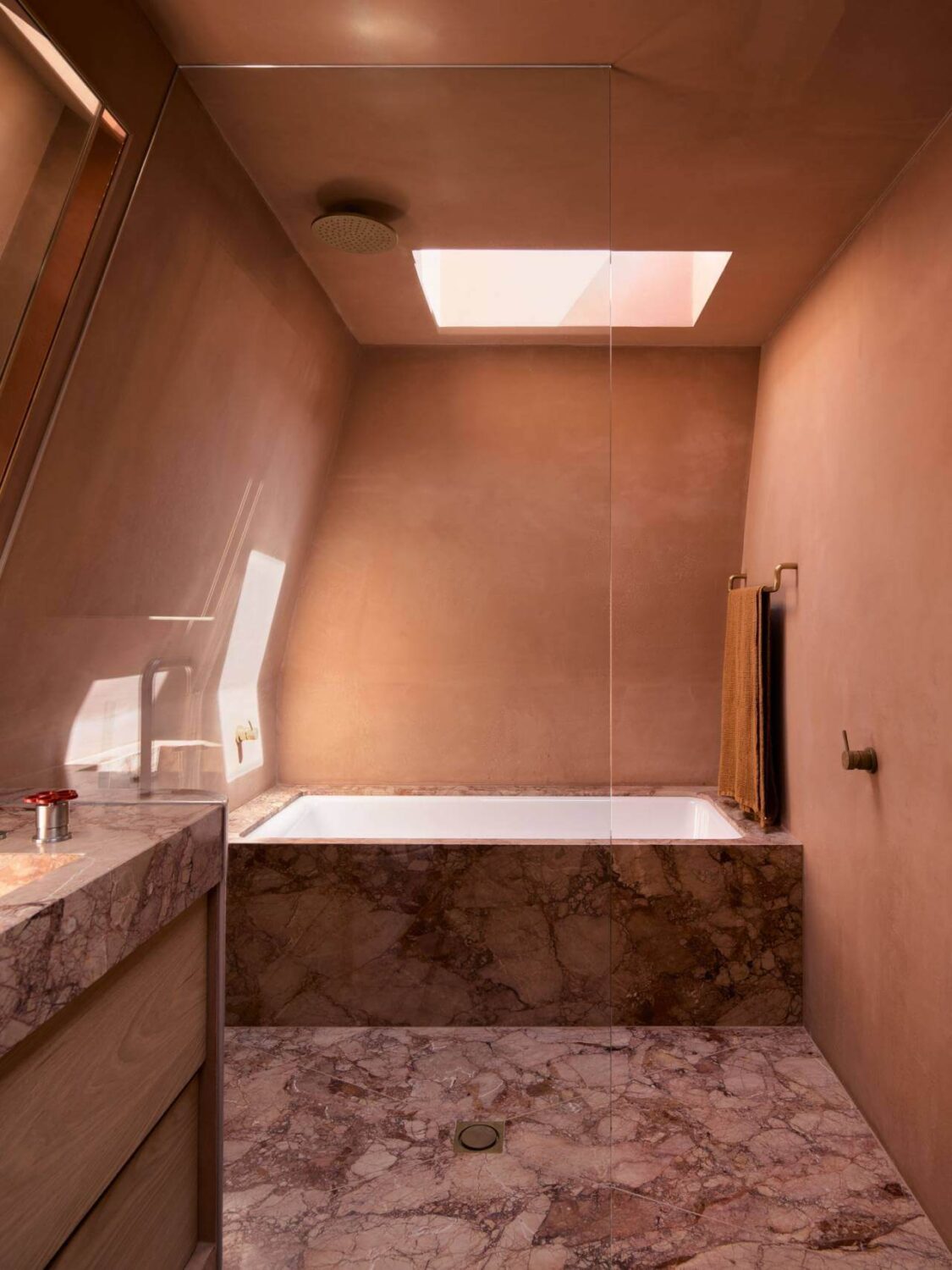 Simple Bathroom Design Ideas That Will Wow You 20 earthy-simple-bathroom-marble-floor-bath-skylight-nordroom