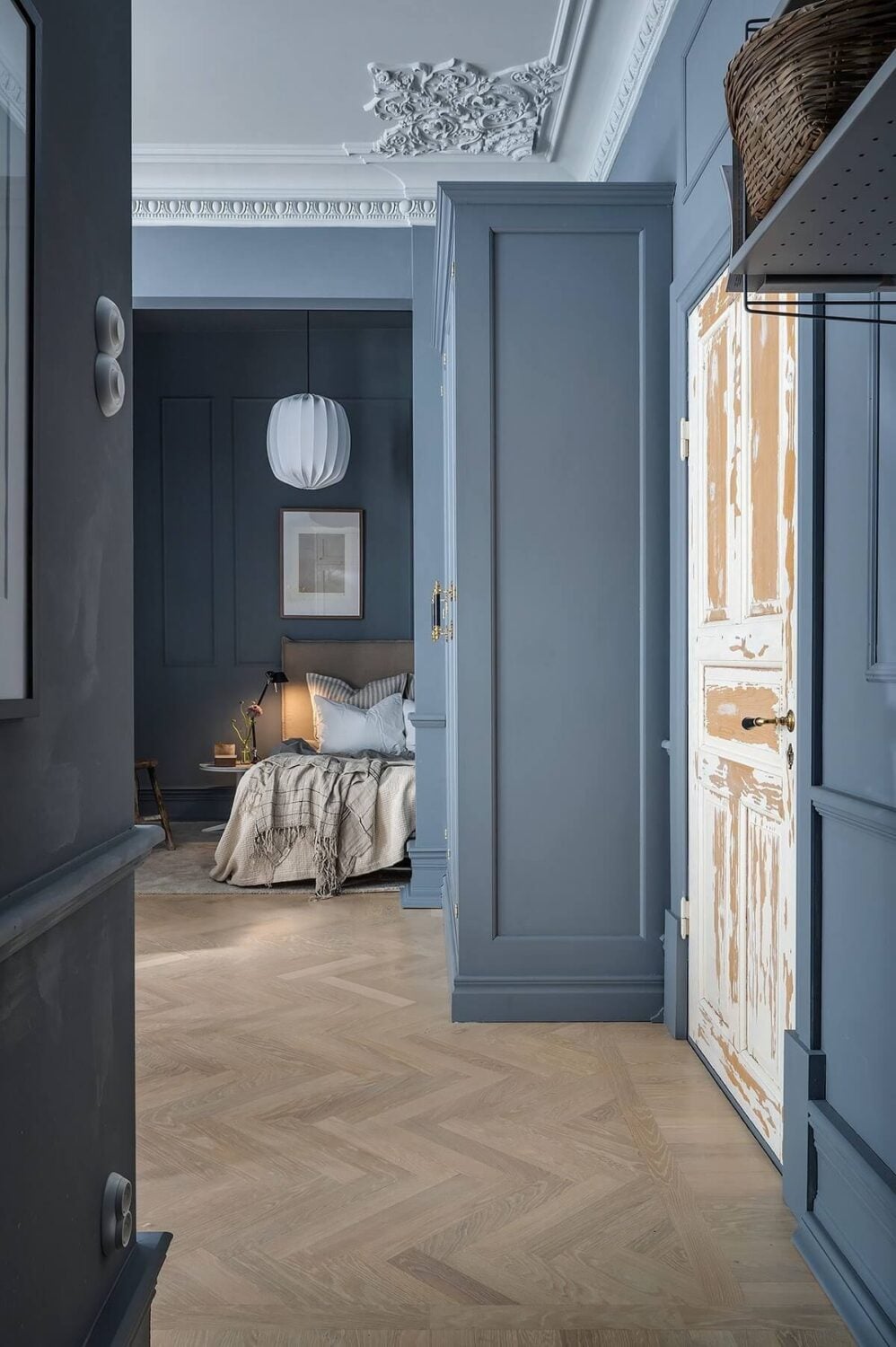 A Luxurious Blue and Gray Studio Apartment 23 entrance-blue-studio-apartment-raw-wooden-door-nordroom