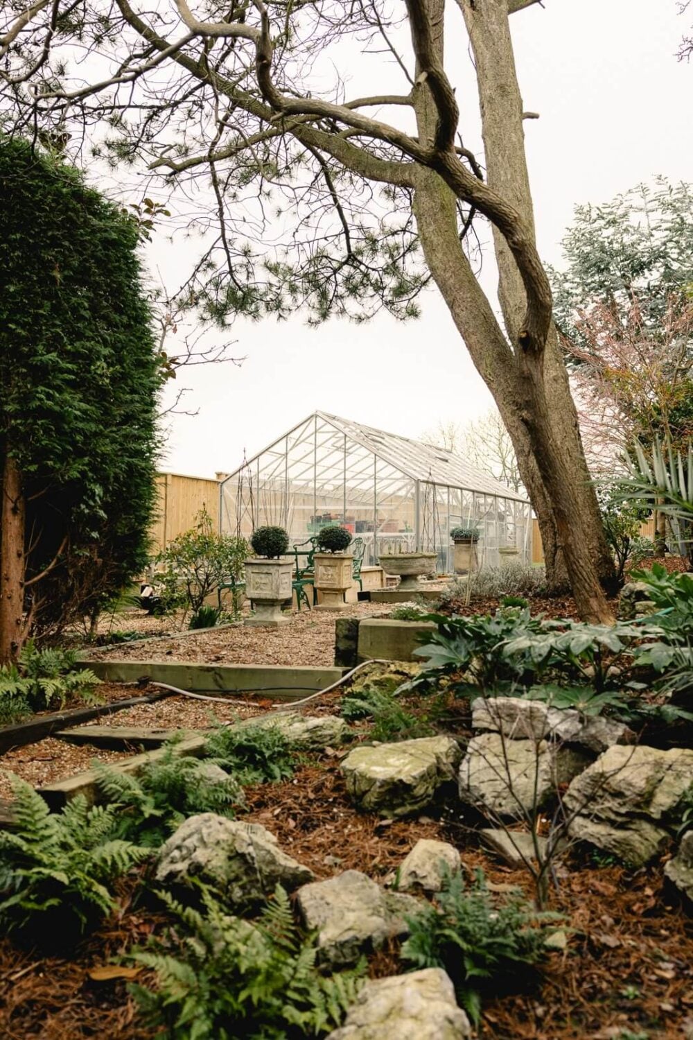A Green Kitchen with Pink Ceiling in a Colorful London Home 29 garden-greenhouse-edwardian-home-london-nordroom