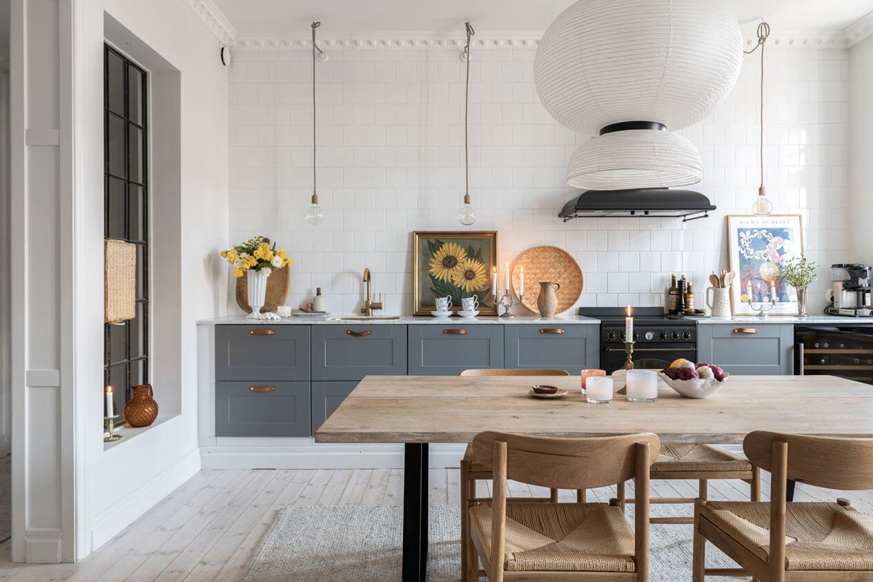 A Lovely Natural Apartment in Sweden 5 gray-kitchen-large-dining-table-nordic-home-nordroom