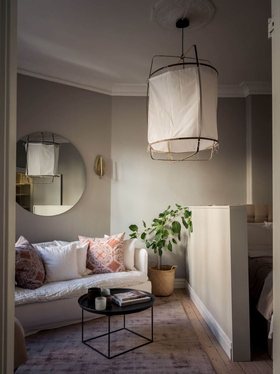 Great Living Room Bedroom Combo Ideas (Layout Tips + Styling) 16 gray-scandinavian-studio-apartment-round-mirror-nordroom
