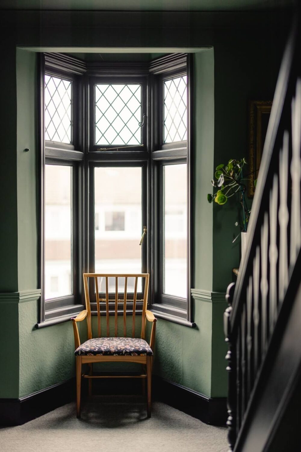 A Green Kitchen with Pink Ceiling in a Colorful London Home 22 green-staircase-bay-window-nordroom