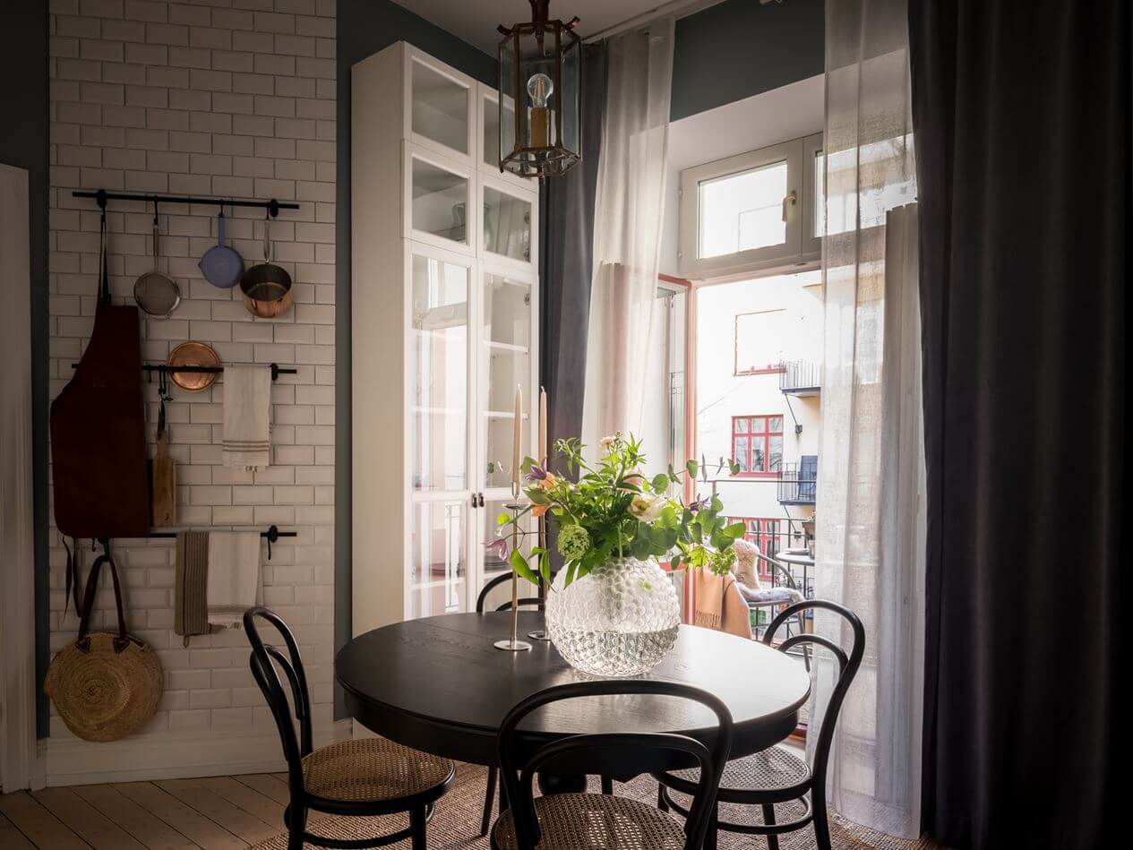 A Gray Studio Apartment with Spacious Kitchen 11 kitchen-black-round-table-studio-apartment-nordroom