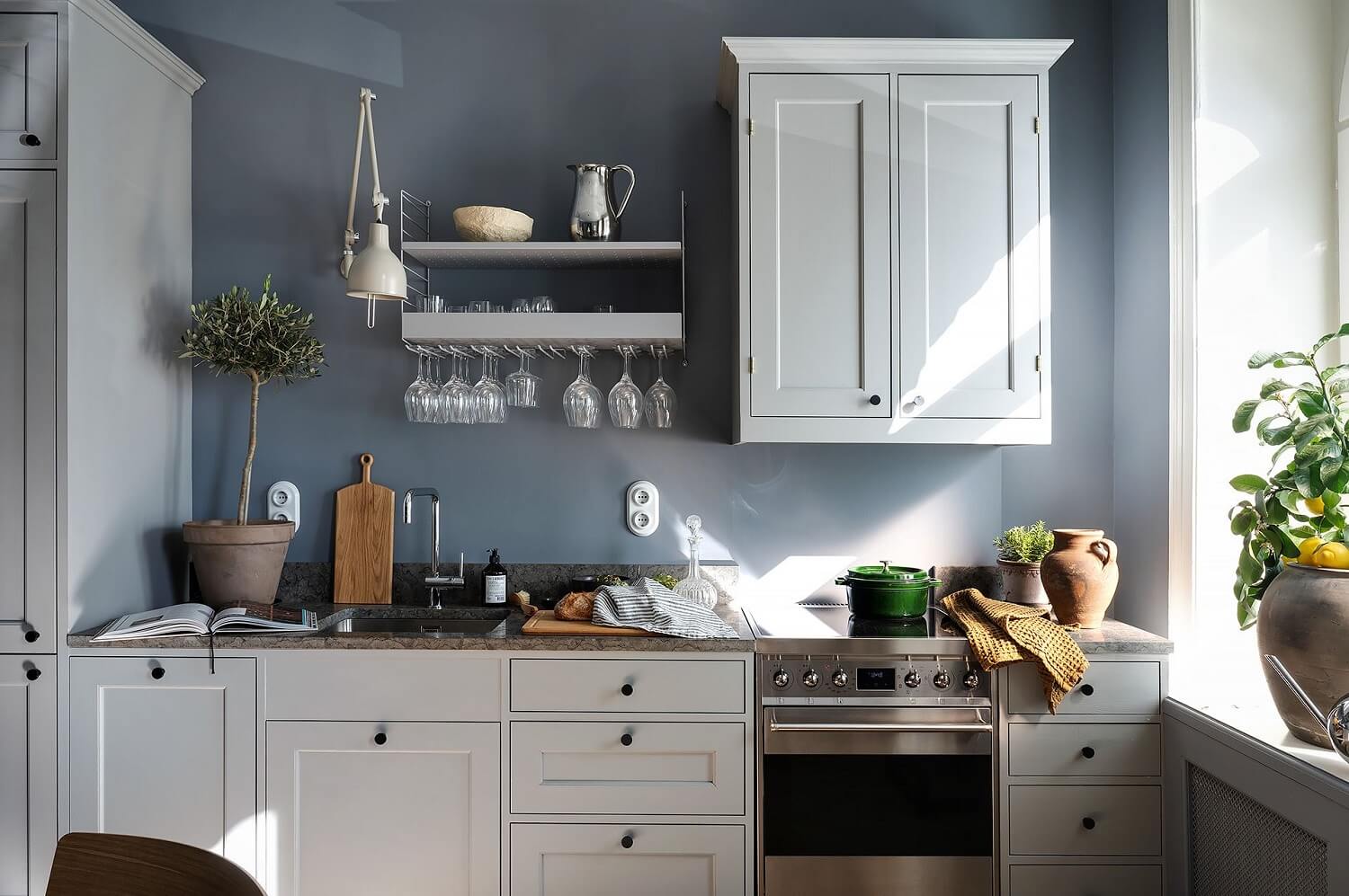 A Luxurious Blue and Gray Studio Apartment 6 light-gray-kitchen-blue-studio-apartment-nordroom