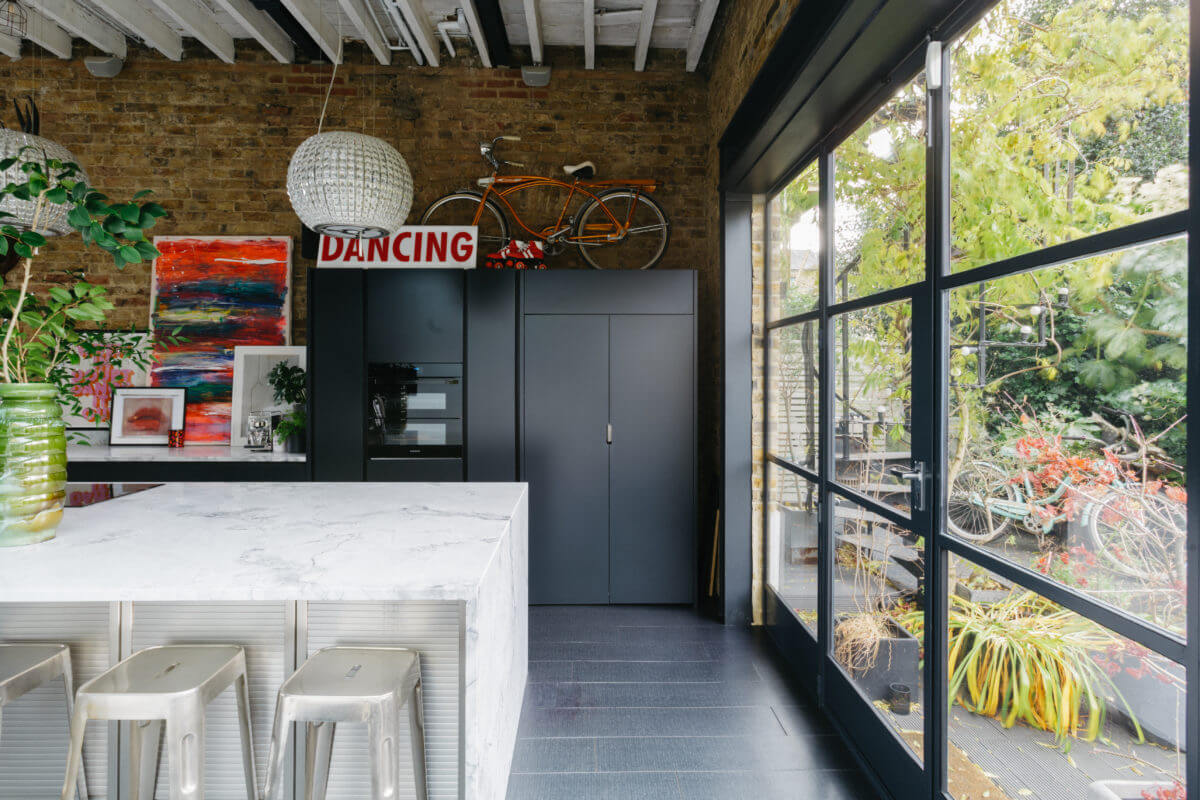 A Black and White Victorian House in London 5 modern-black-white-kitchen-brick-wall-steel-framed-doors-nordroom