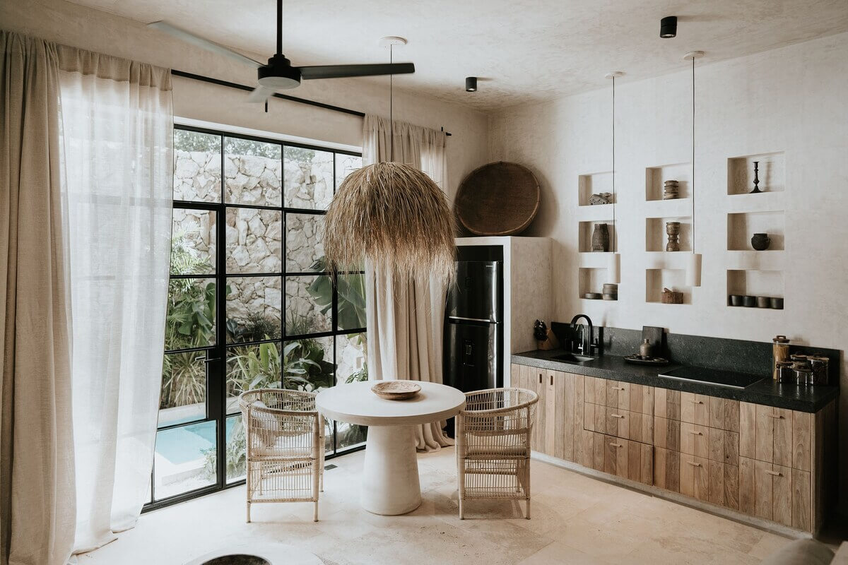 A Serene Loft Airbnb in Tulum, Mexico 8 natural-kitchen-steel-framed-glass-doors-airbnb-tulum-nordroom