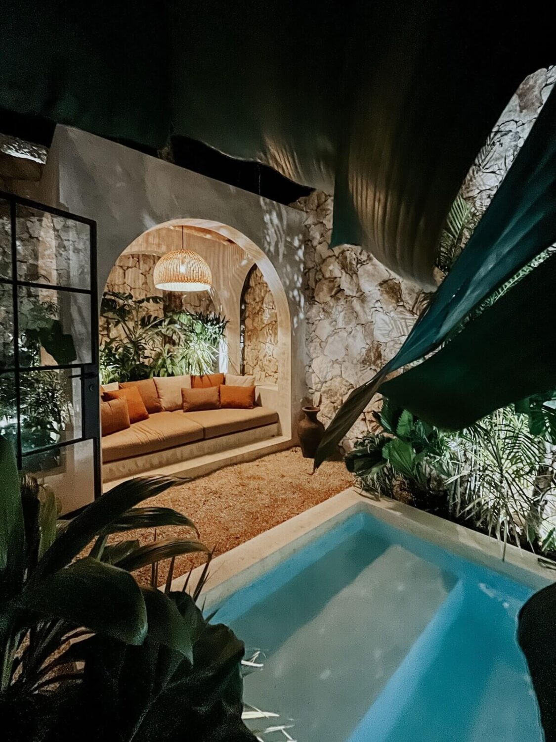 A Serene Loft Airbnb in Tulum, Mexico 26 outdoor-terrace-swimming-pool-at-night-airbnb-tulum-nordroom