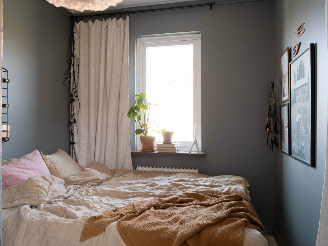 A Warm Neutral Colored Nordic Home 23 scandinavian-bedroom-gray-green-walls-nordroom