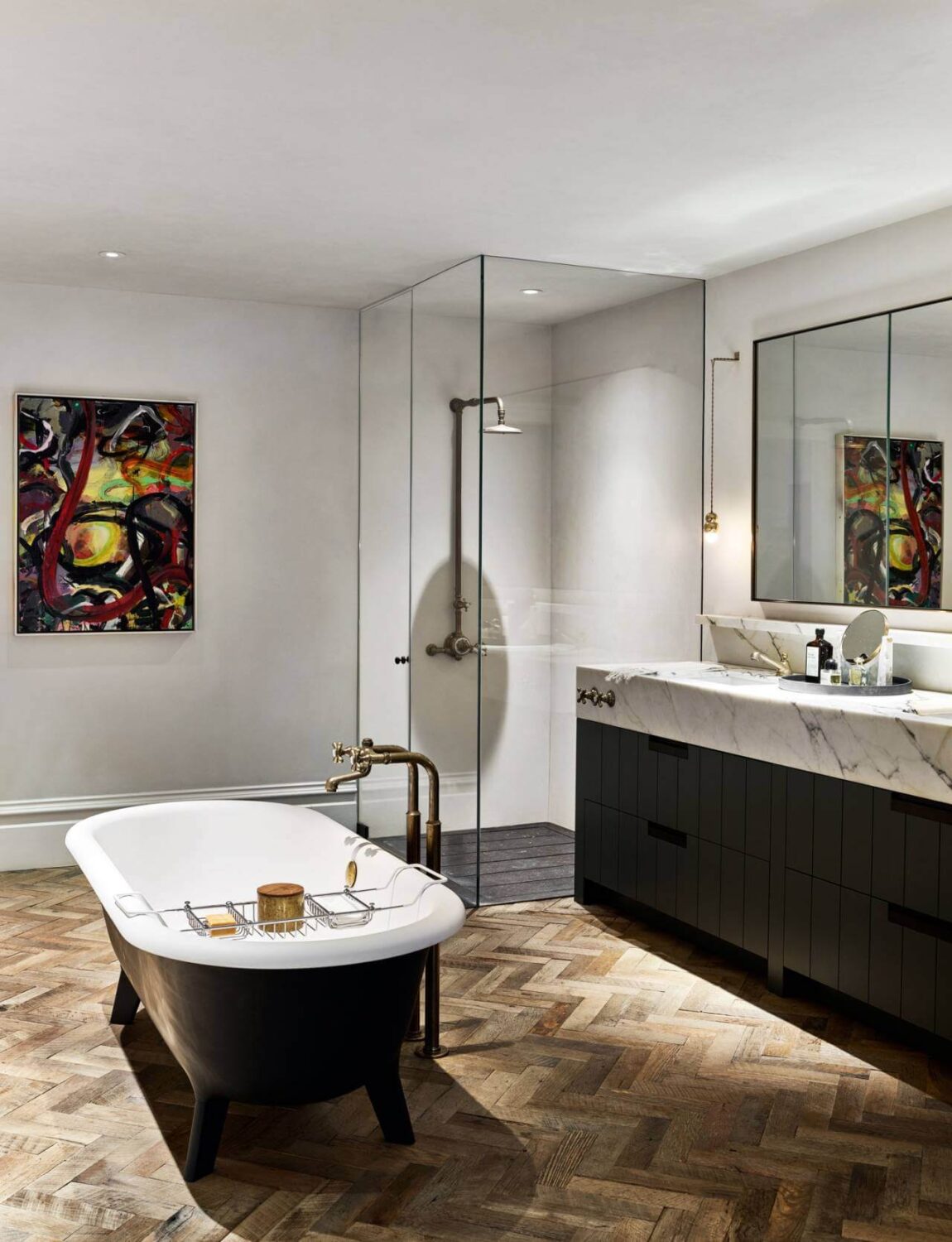 Simple Bathroom Design Ideas That Will Wow You 17 simple-luxurious-bathroom-wood-floor-marble-freestanding-bathtub-black-accents-nordroom