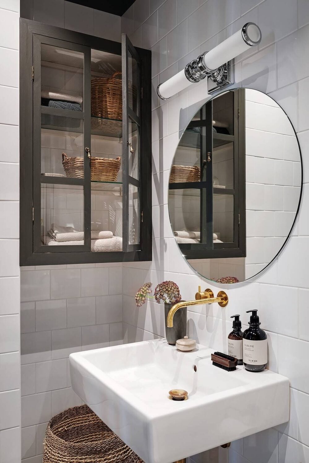 A Luxurious Blue and Gray Studio Apartment 20 small-bathroom-round-mirror-studio-apartment-nordroom