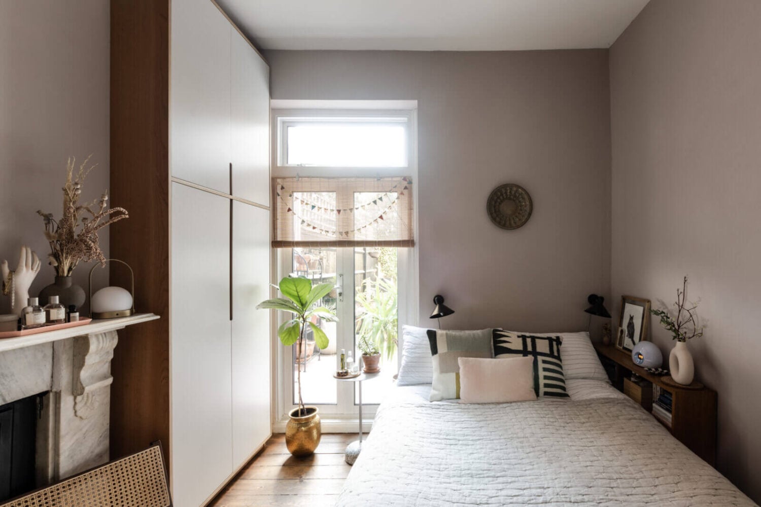 A Cozy Flat in London with Navy Blue Living Room 13 small-bedroom-fireplace-wardrobes-london-flat-nordroom