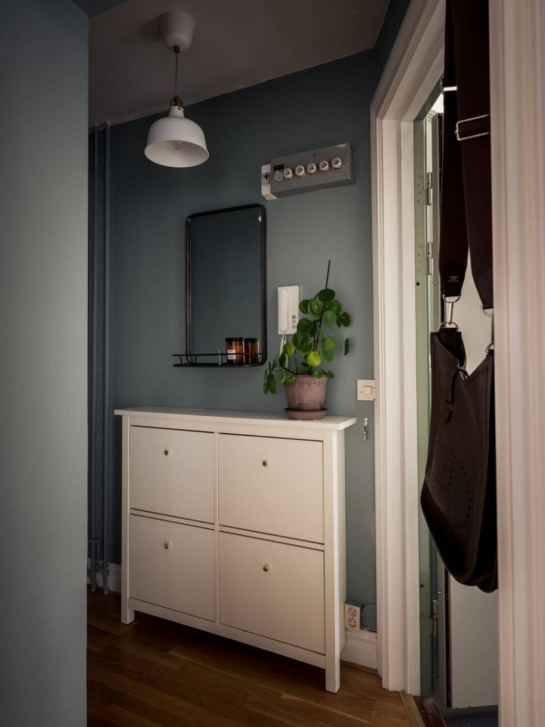 A Gray Studio Apartment with Spacious Kitchen 13 small-gray-hallway-nordic-studio-apartment-nordroom