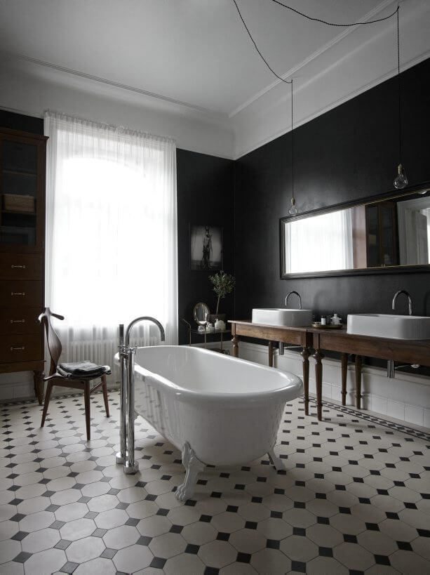 50 Amazing Black Bathroom Design Ideas 22 spacious bathroom black walls freestanding bath nordroom 50 Amazing Black Bathroom Design Ideas