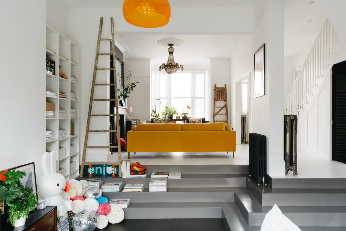 A Black and White Victorian House in London 13 split-level-living-room-kitchen-yellow-sofa-nordroom