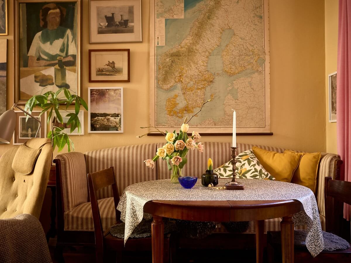 A Small Vintage Apartment with Warm Yellow Walls 7 vintage-dining-nook-yellow-walls-nordroom