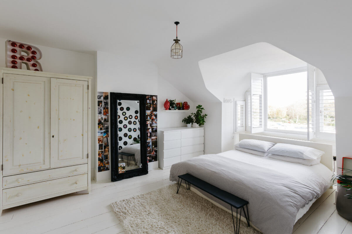 A Black and White Victorian House in London 31 white-bedroom-slanted-ceiling-nordroom