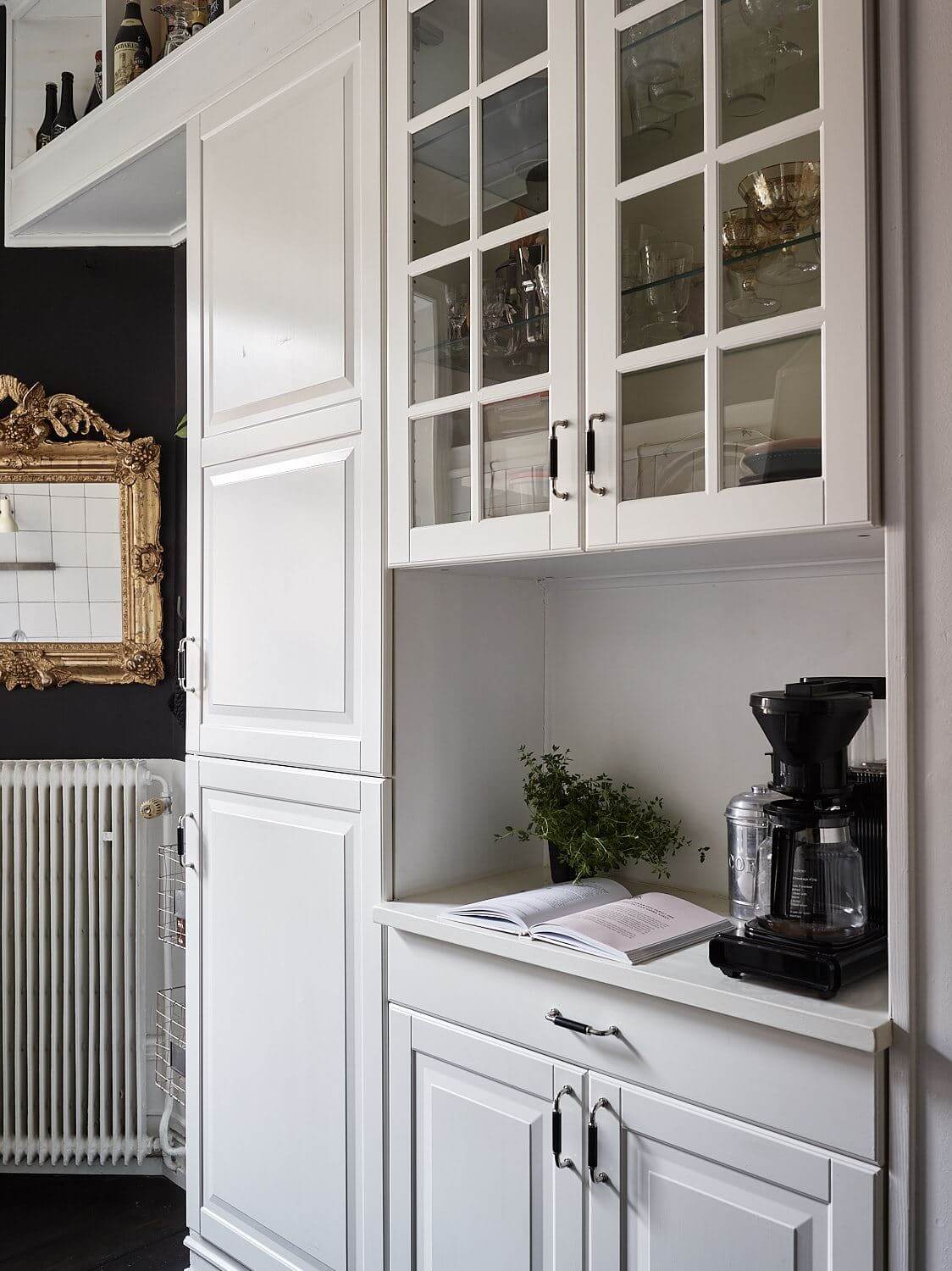 A Black Vintage Studio Apartment 14 white-built-in-cabinets-kitchen-black-studio-apartment-nordroom