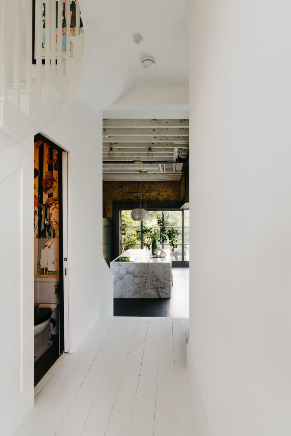 A Black and White Victorian House in London 19 white-hallway-kitchen-marble-island-nordroom