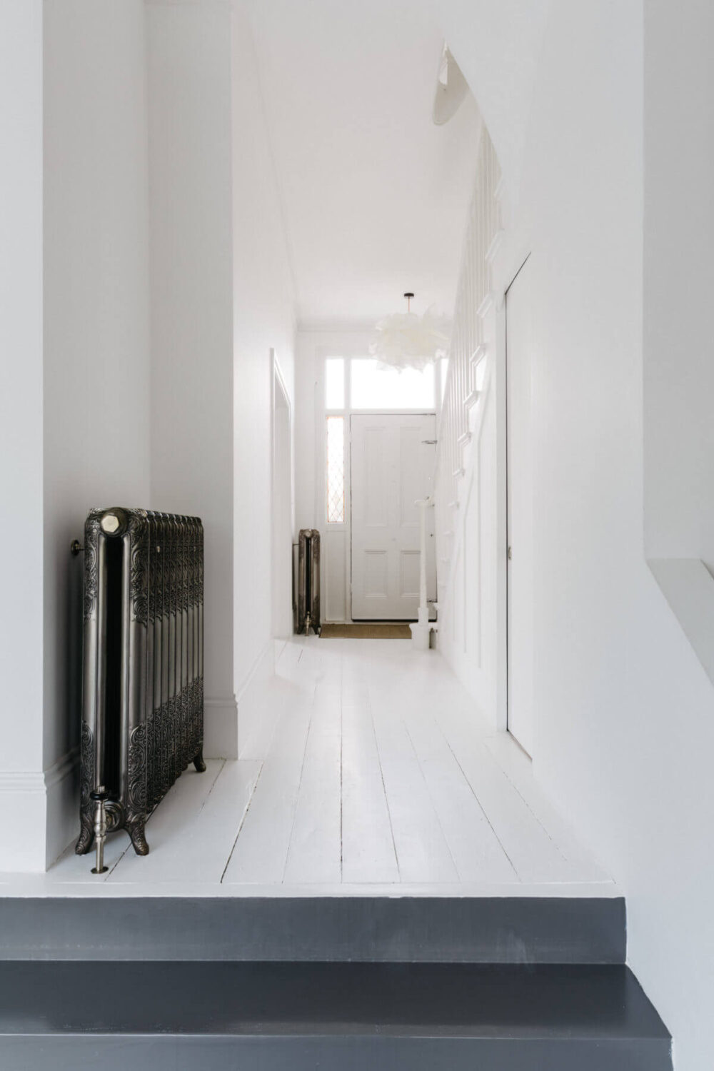 A Black and White Victorian House in London 20 white-hallway-open-plan-monochrome-victorian-house-london-nordroom