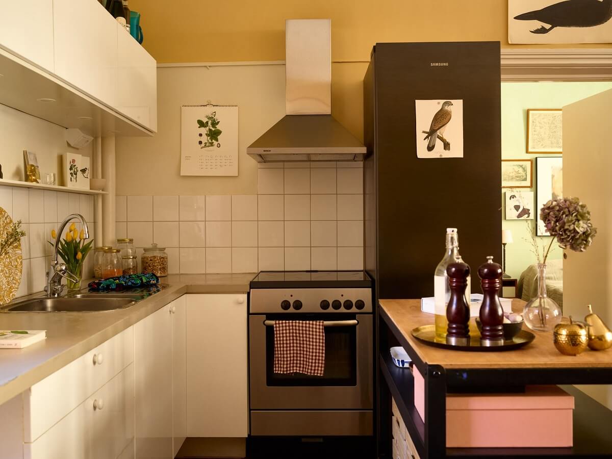 A Small Vintage Apartment with Warm Yellow Walls 9 white-kitchen-vintage-home-nordroom