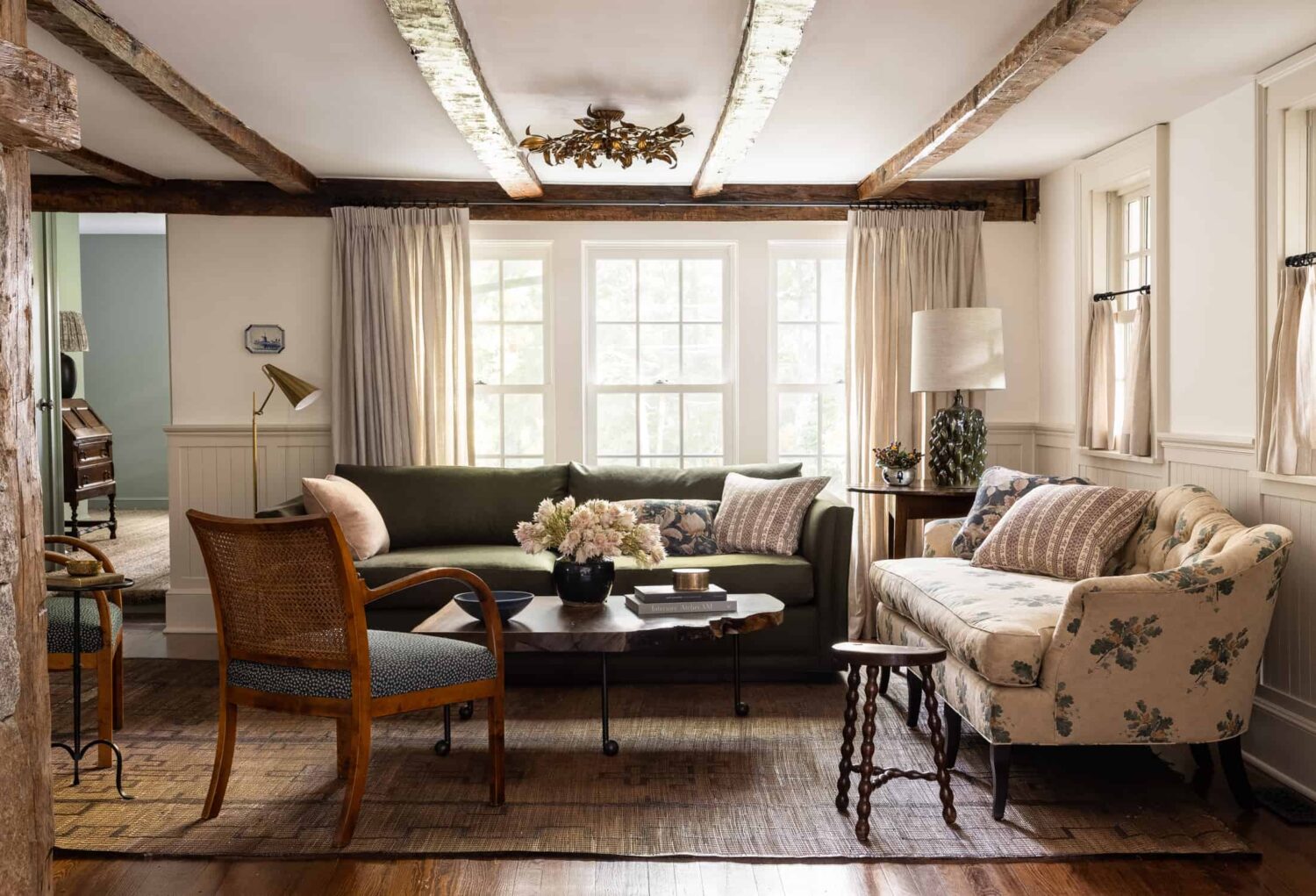 Patterns and Historic Charm in a Bedford Home 11 Heidi-Caillier-Design-Hudson-Valley-farmhouse-living-room-old-beams-pattern-textiles-Nordroom