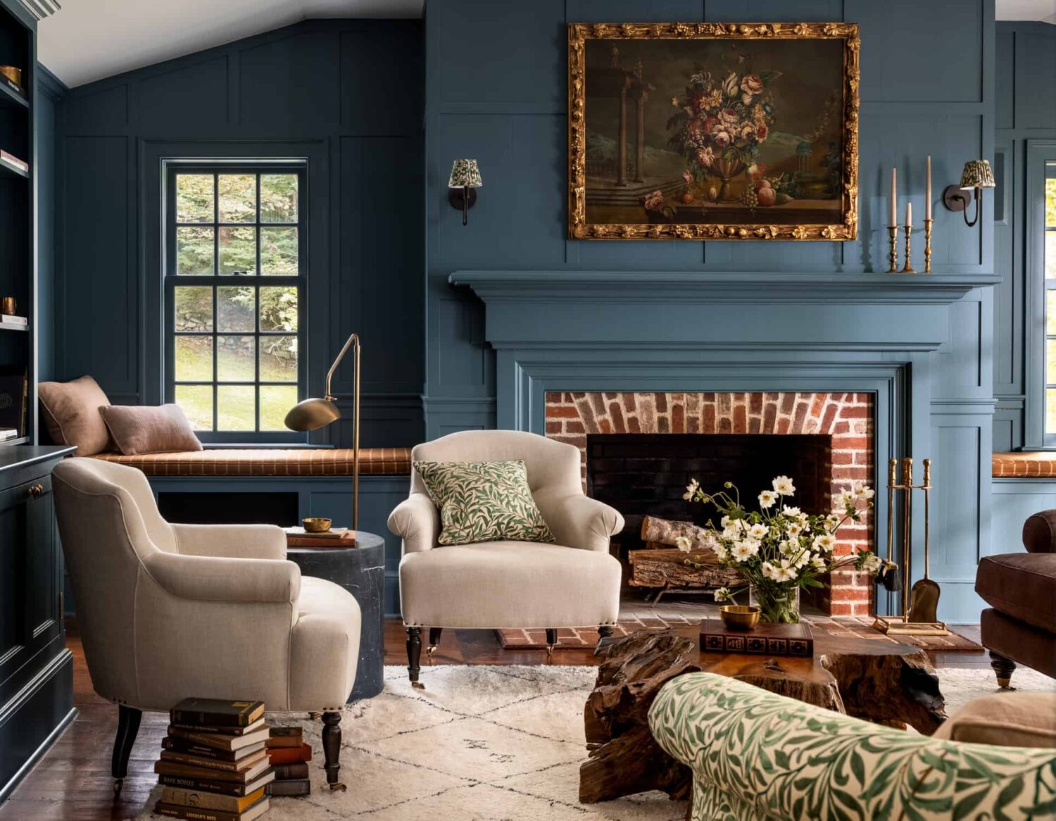 Patterns and Historic Charm in a Bedford Home 2 Heidi-Caillier-Design-Hudson-Valley-house-dark-blue-family-room-william-morris-sofa-vintage-floral-painting-Nordroom