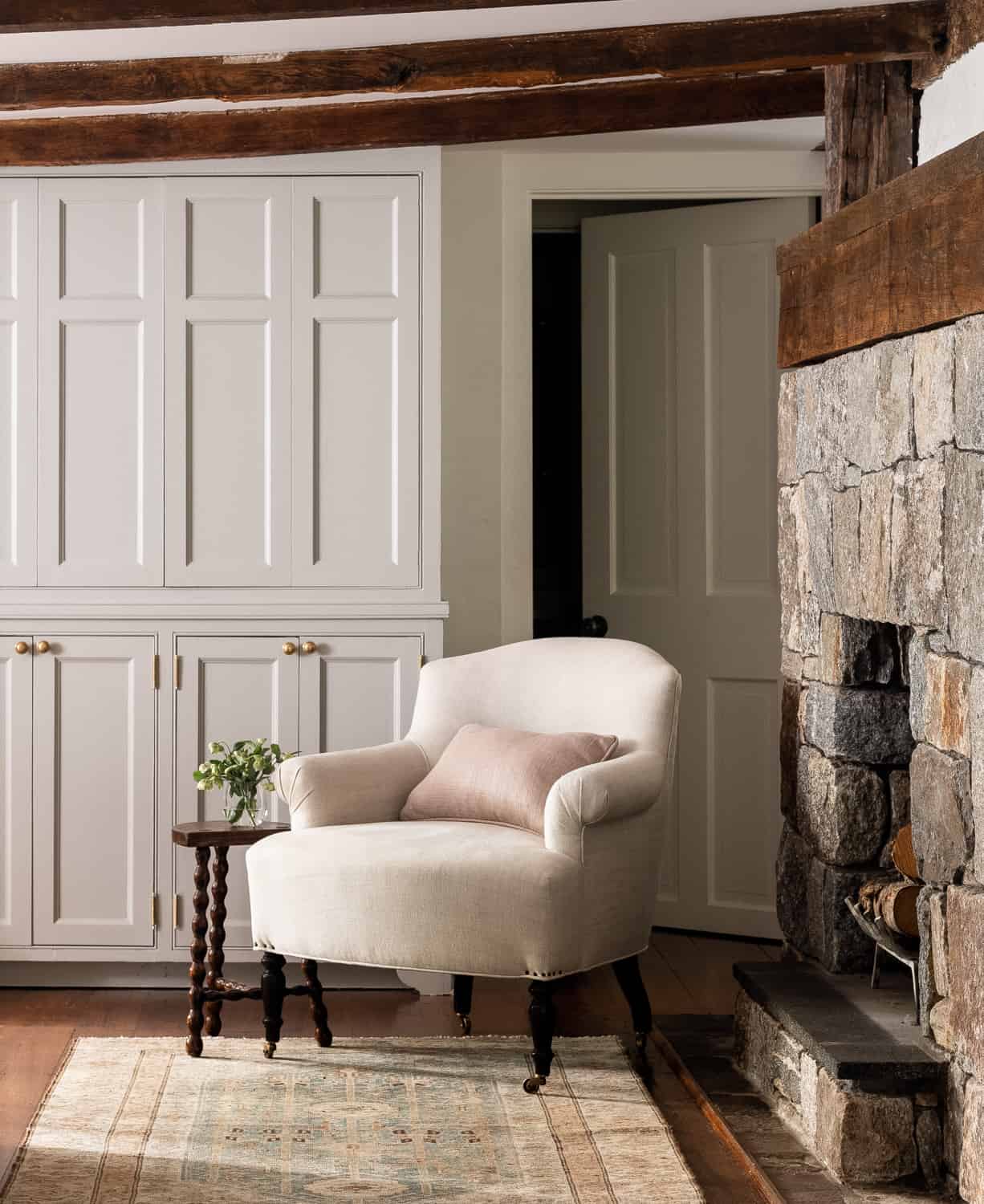Patterns and Historic Charm in a Bedford Home 19 Heidi-Caillier-Design-Hudson-Valley-house-english-kitchen-devol-grey-cabinets-lounge-chair-in-kitchen-Nordroom