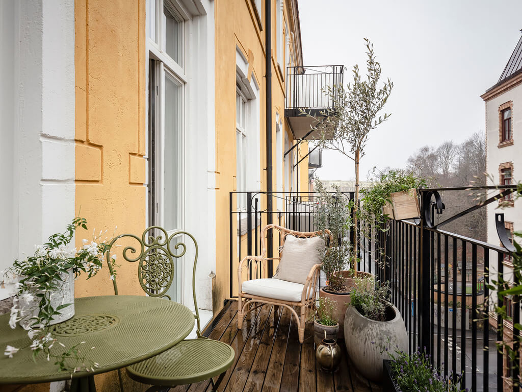A Bright Nordic Home with Small (but Smartly Designed) Bedrooms 31 balcony-scandinavian-apartment-nordroom