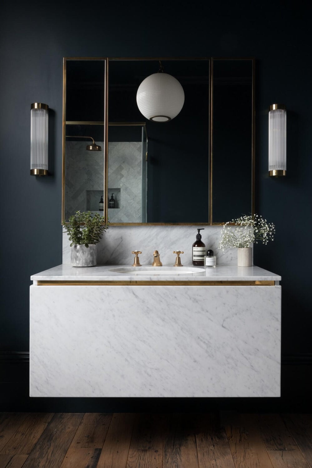 Contrasting Styles in a Victorian Home in London 24 bathroom-dark-blue-walls-white-vanity-wooden-floor-victorian-home-london-nordroom
