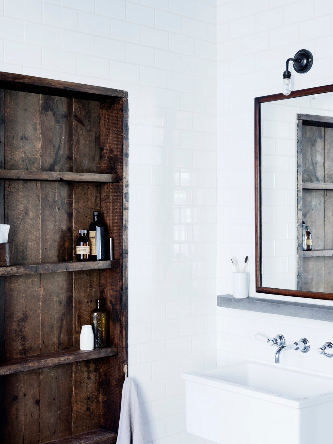 An Industrial Apartment by Mark Lewis Interior Design 16 bathroom-rustic-wooden-shelves-mark-lewis-nordroom