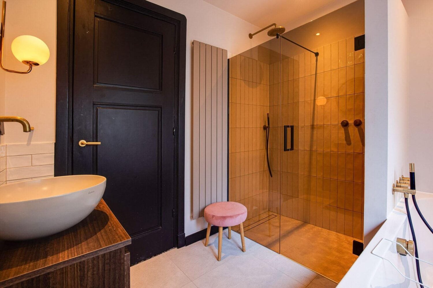 A Dutch Family Home with Warm Color Accents 24 bathroom-walk-in-shower-black-doors-nordroom