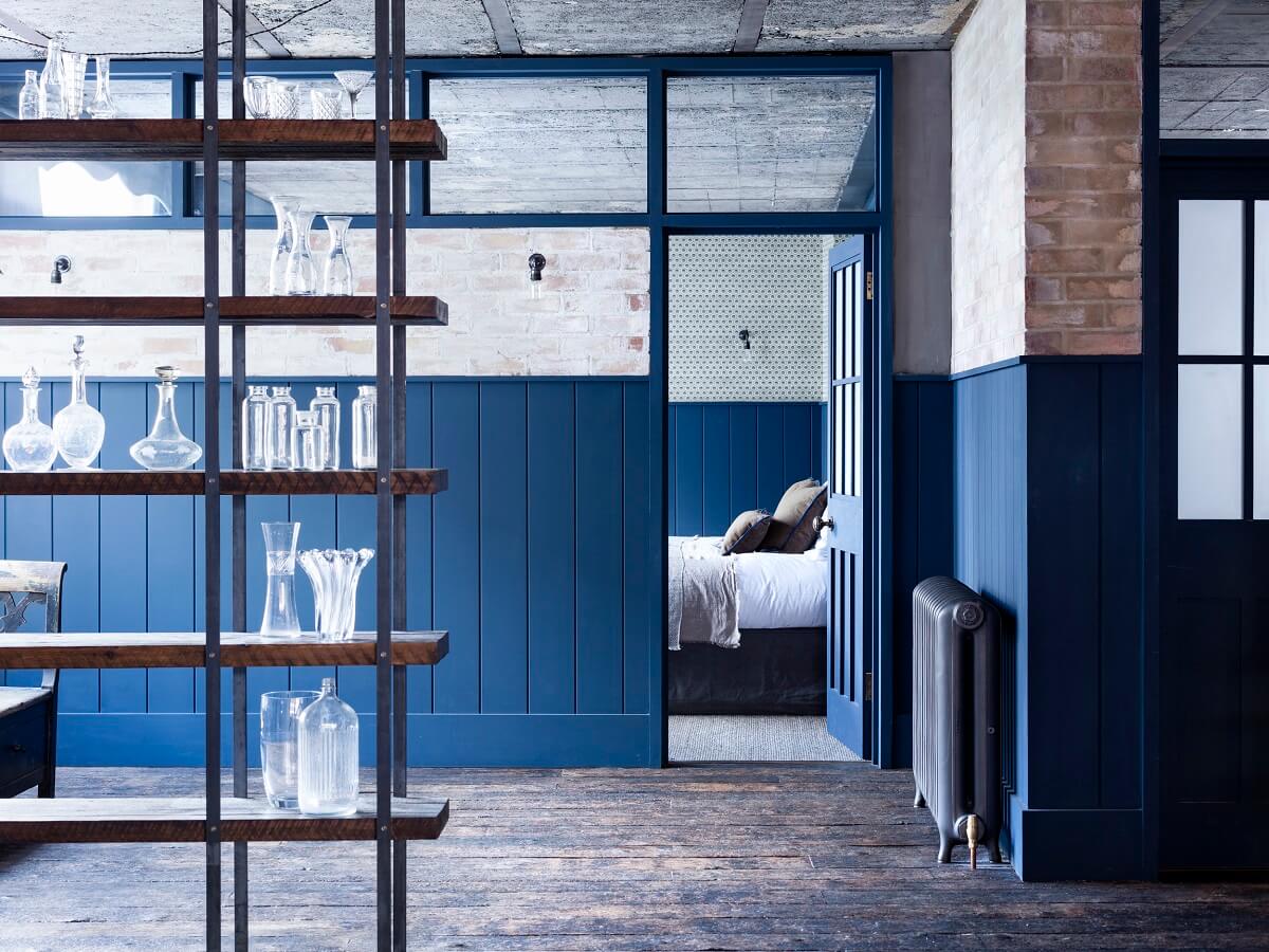 An Industrial Apartment by Mark Lewis Interior Design 10 bedroom-brick-wall-blue-cladded-walls-nordroom