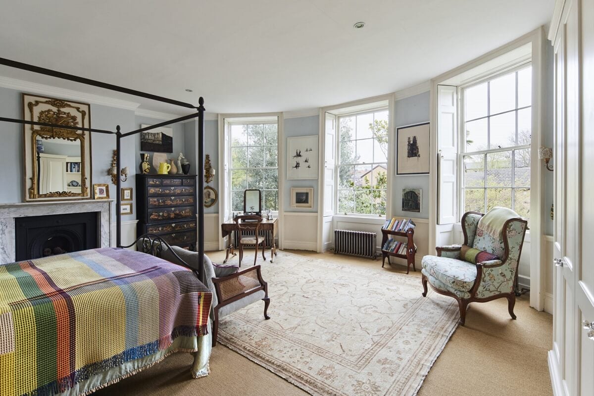 An Eclectic Art-Filled Townhouse in London 10 bedroom-canopy-bed-fireplace-art-filled-eclectic-home-london-nordroom