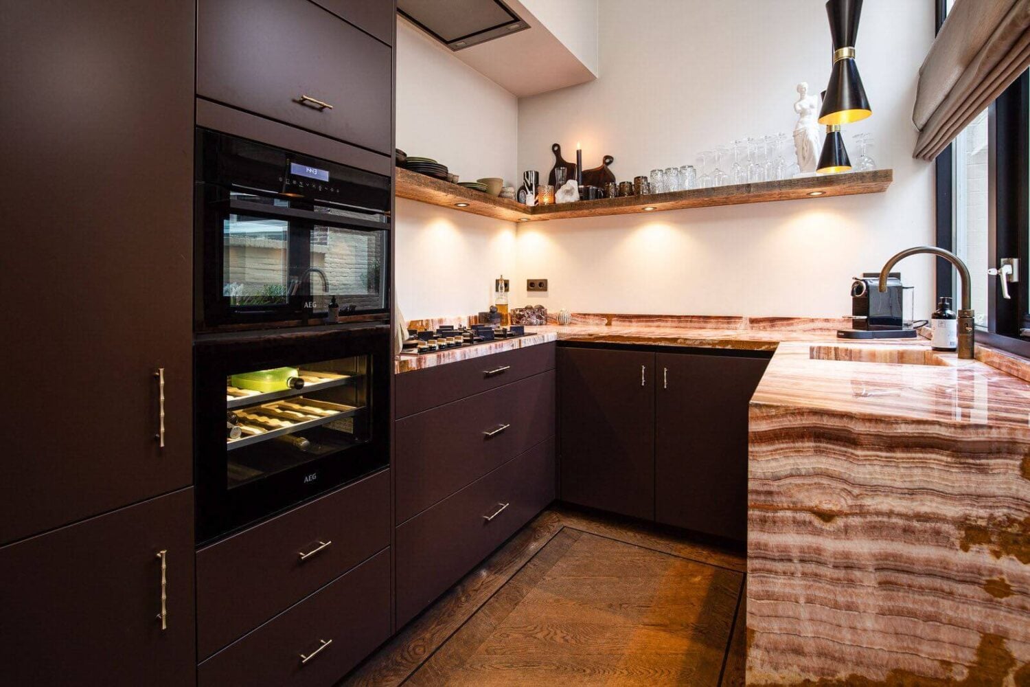 A Dutch Family Home with Warm Color Accents 10 black-kitchen-onyx-marble-worktop-dutch-family-home-nordroom