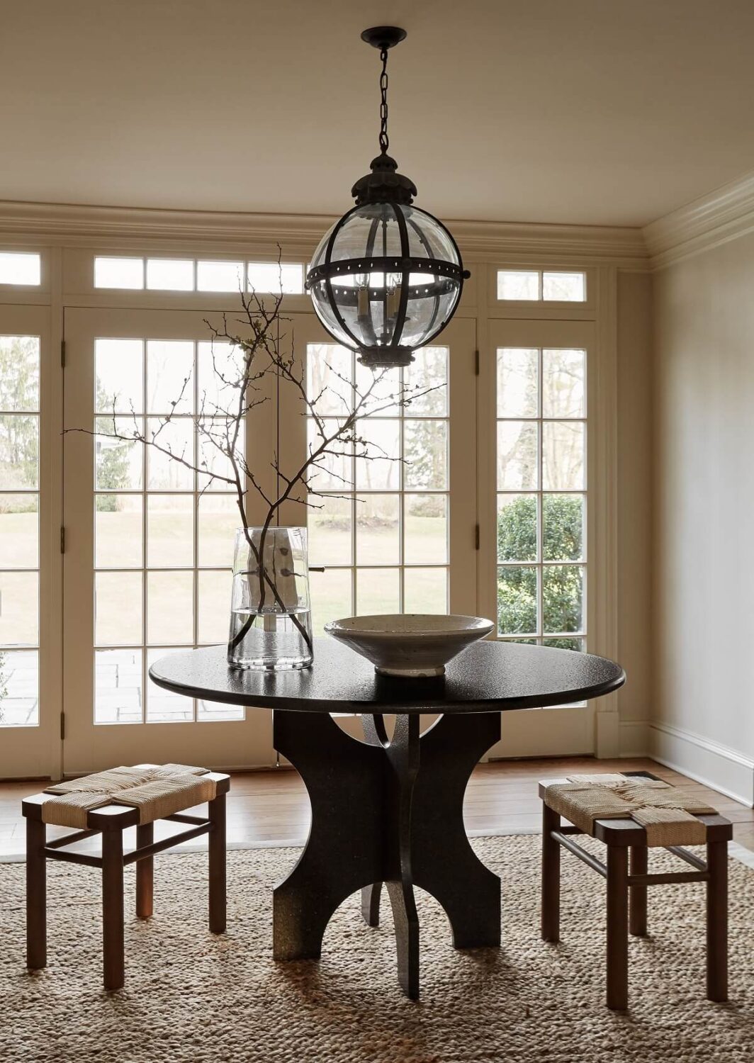A Warm Family Home in Connecticut 8 black-round-table-knitted-rug-nordroom